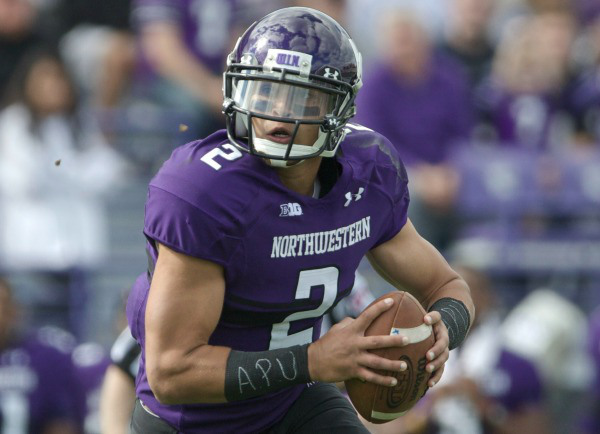 Kain Colter, leader of the labor movement, typically sports wrist tape bearing the acronym APU, standing for “All Players United.” (Photo via Sports Illustrated)
