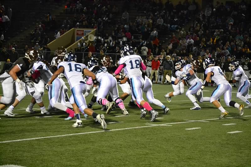 Nazareth football players don pink in support of Breast Cancer Awareness Month.