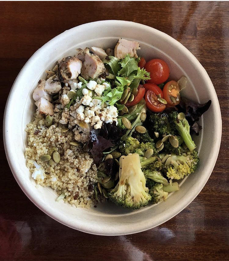 Salad with grilled chicken, quinoa, and vegetables
