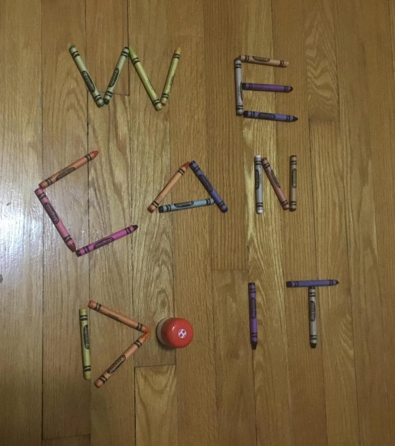 Encouraging message spelled out with crayons