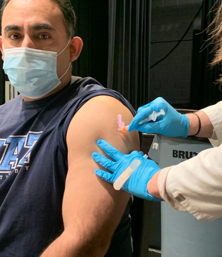 Theology teacher Tony Miranda received his first dose of the COVID-19 vaccine today		