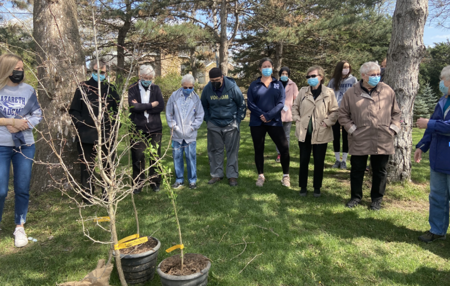 Sisters+from+The+Congregation+of+St.+Joseph%2C+faculty%2C+and+students+come+together+to+bless+the+trees+before+planting+them.