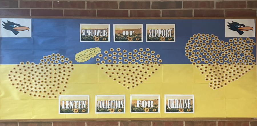 Bulletin board displaying sunflowers that represent a donation made by a 
member of the Nazareth family.