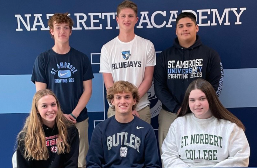 Signing event April 12. Standing left to right: Sam Wampler, Dominic 
Trelenberg, Isaias Martinez, Sitting left to right: Mary Titzer, Ryan Short, Emma Akalaitis