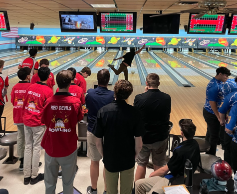 Senior Nico Milano bowls at the Lisle High School Regional. 
