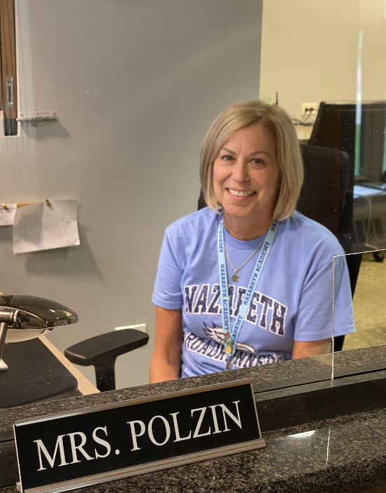 Ellen Polzin at the front desk. 
