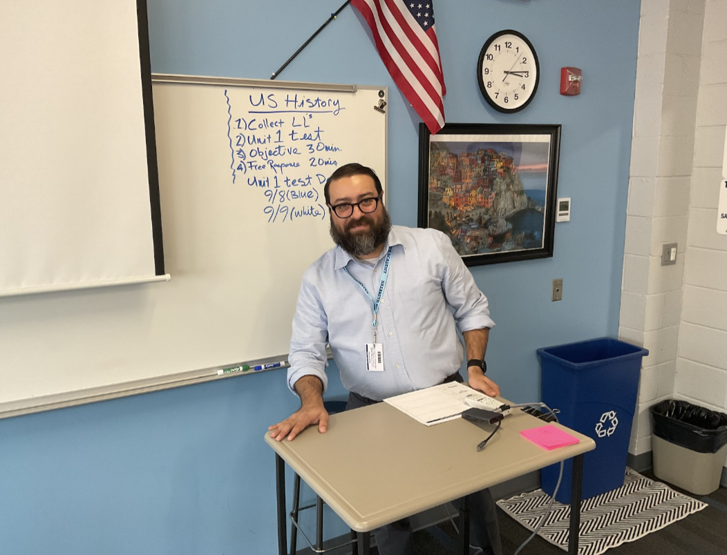 Mendelson in his history classroom.      
