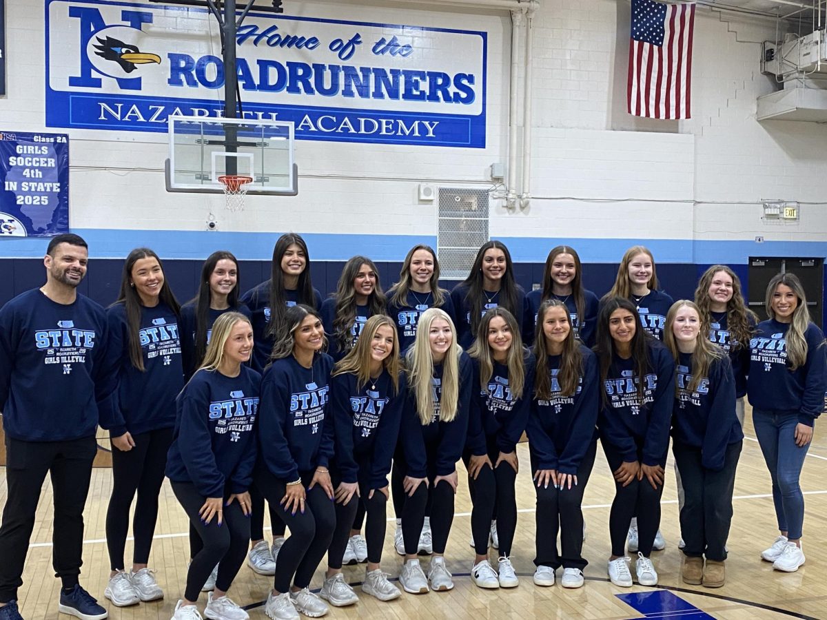 After the clap-out on Thursday, the team gathered in the Rooney Gym before heading to Normal.	                   
